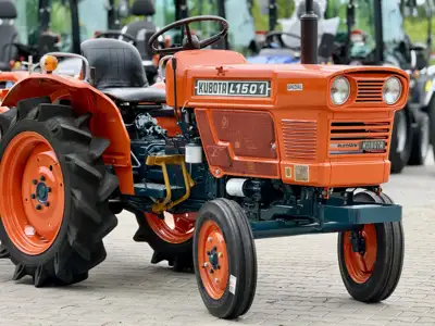 Parduodamas Kubota L-1501 (2wd) su žemės dirbimo freza
