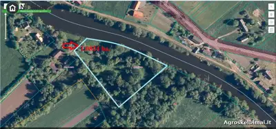 RUSNĖS SALOJE, PAKALNĖS KAIME PRIE PAKALNĖS UPĖS PARDUODAMAS ŽEMĖS ŪKIO PASKIRTIES ŽEMĖS SKLYPAS